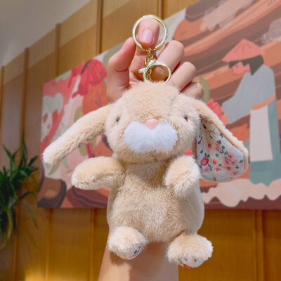 O1CN01c5E8AU21il554Se5P_!!6000000007019-0-cib Cute Plush Cartoon Keychain-Plush sitting floral rabbit - brown